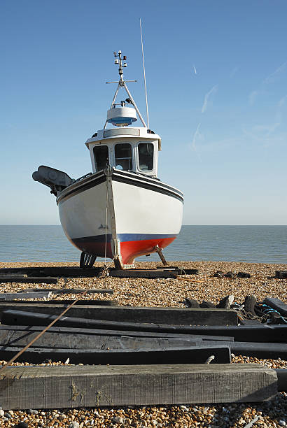 istock Fishing boat on the beach 145189042