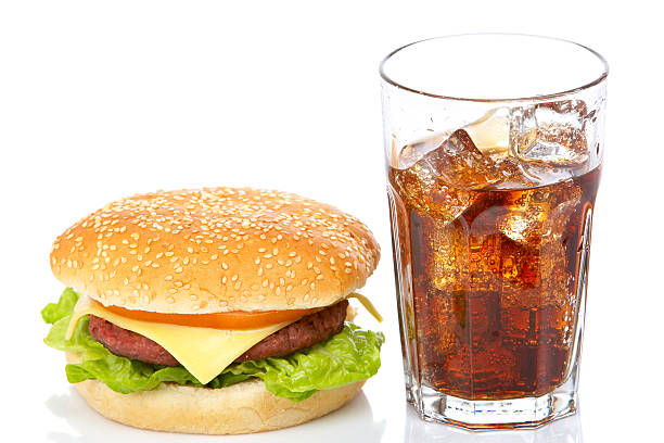 istock Cheeseburger and soda glass 145189260