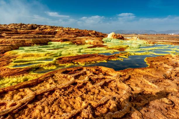 istock Sulfurous formations created by upwelling volcano springs in Ethiopia 1451893169