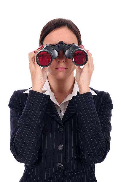 istock Businesswoman looking through binoculars 145189991