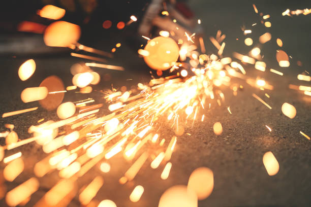 White hot sparks when grinding steel, metalworking