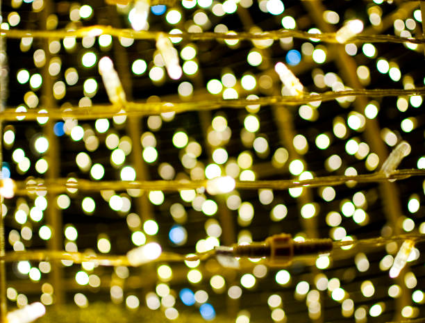 istock Christmas defocused decorated tree garlands. 1451905429