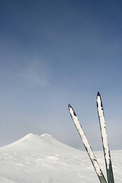 Nordic skis and summit stock photo