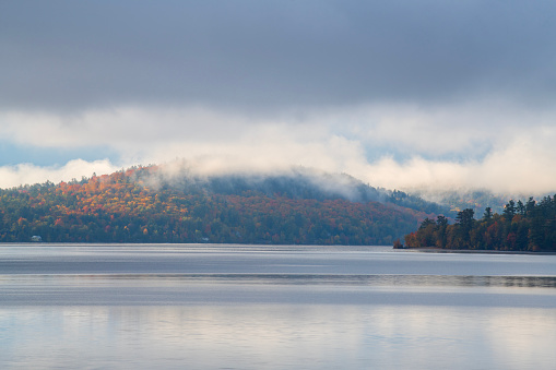 Foggy autumn scene during a calm morning in the White Mountains. in Grafton, NH, United States