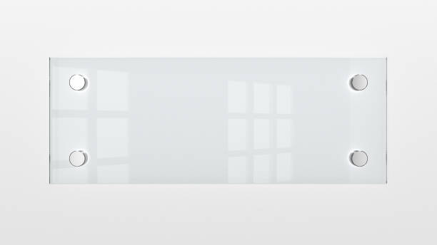 istock Closeup of wall-mounted blank glass nameplate. 1451921396