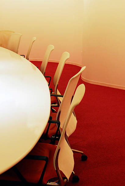 Red Floor White Table stock photo