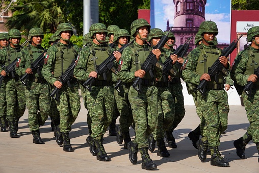 los mochis, Mexico – September 13, 2022: The Mexican soldiers marching during a civic ceremony on the Flag day of Mexico in Chapultepe square