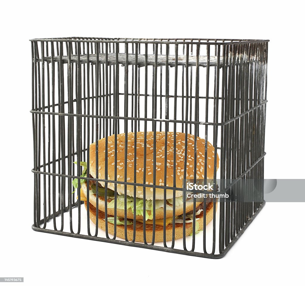 Dieta conceito de fast food atrás das grades - Foto de stock de Grade de Prisão royalty-free