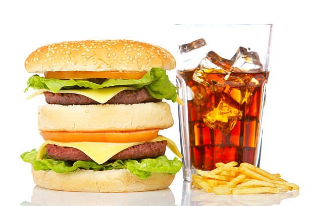 istock Double cheeseburger, soda and french fries 145193820