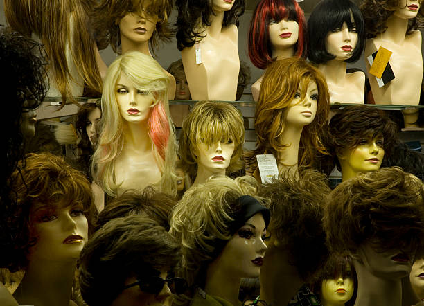 istock manikin heads in a wig store 145193870