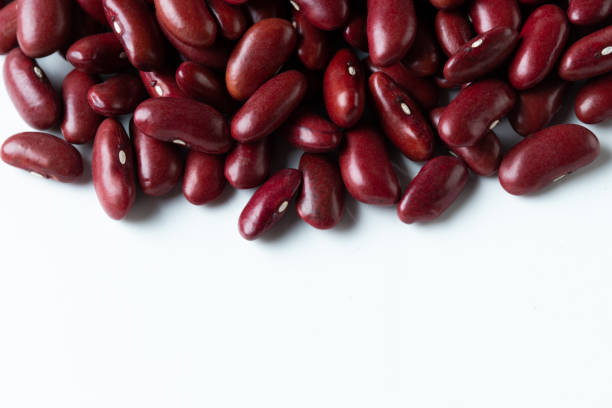 istock Pile set of red bean, red grain beans pouring down abstract cloud group. Beautiful complete seed pea bean, food object design. Selective focus freeze shot white background isolated 1451942609