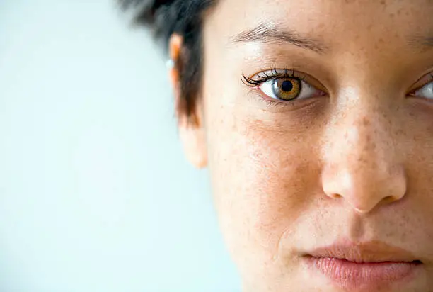 Close-up portrait of young Caucasian female's face.