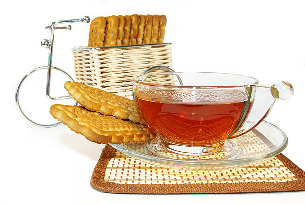 istock Bicycle, cookies and a cup of tea 145194834