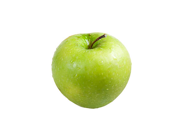 Maçã Verde sobre um fundo branco (isolado - fotografia de stock