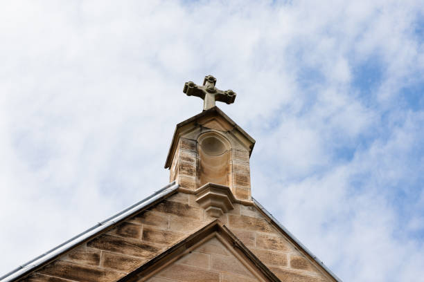 Low angle view of ancient architectural arches against clouds