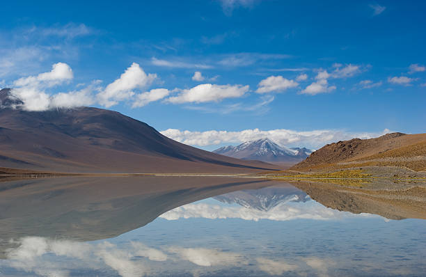 istock mountain, reflecting in the lake, bolivia 145196309