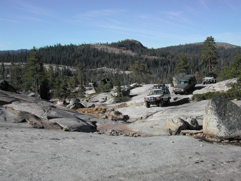 Land Rovers on granite slabs along the Rubicon Trail in August of 2004.  Shot with a Nikon E885.