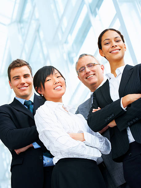 istock Business people with their arms crossed 145196908