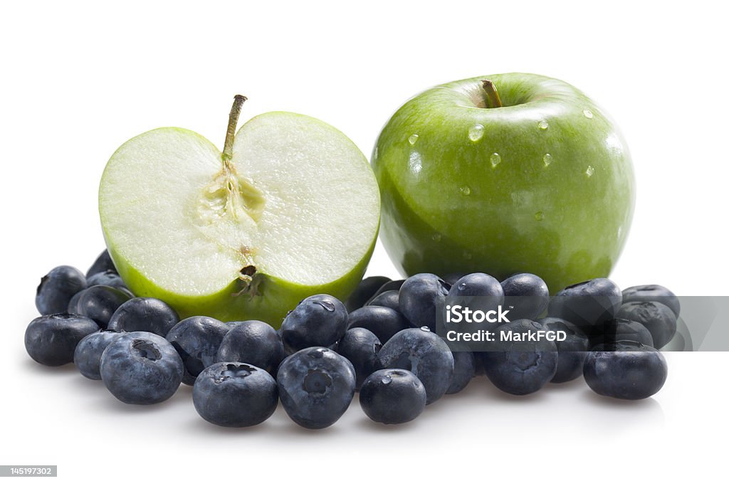 Apples and blueberries Apples and blueberries isolated on white Apple - Fruit Stock Photo