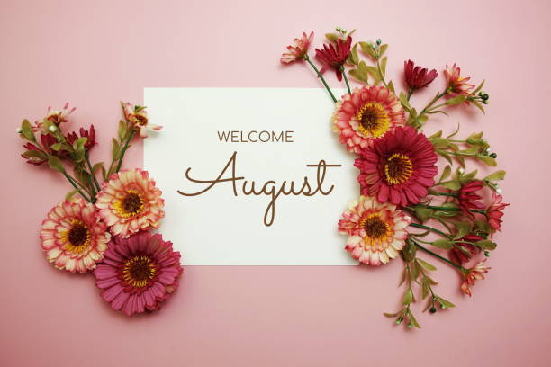 istock Welcome August typography text with flowers on pink background 1452005515