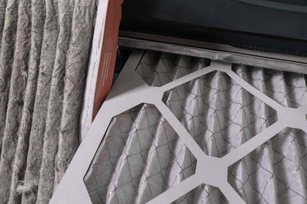 istock Replacing dirty furnace filter in home 1452014458