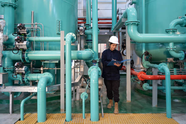 istock A female technician works in a chemical plant 1452018370