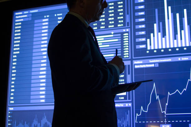istock Close-up of employee preparing market data report 1452022082