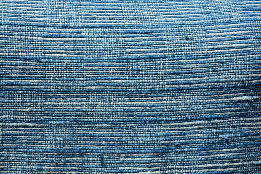 Close-up texture  indigo dyed fabric, dyed with natural plant indigo dye.