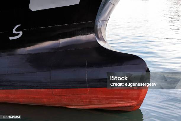Bulbous Bow Of An Industrial Ship Close Up Stock Photo - Download Image Now - Ship's Bow, Black Color, Blue