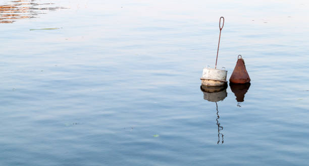 istock Two mooring buoys are in still water 1452034069