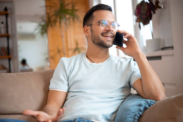 istock Shot of a young man using his smartphone 1452039394