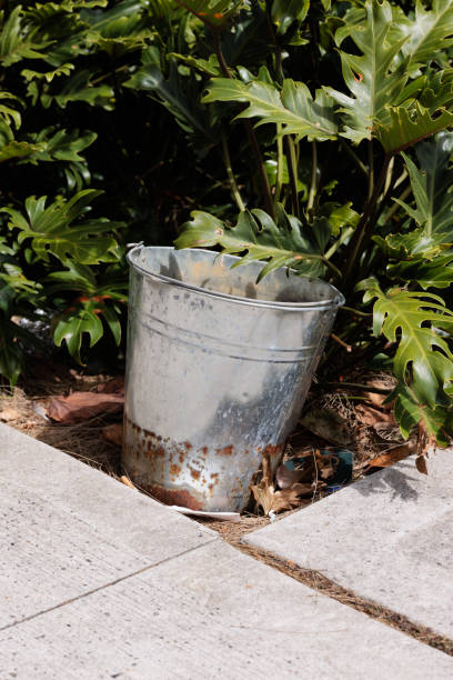 istock Metal bucket in a garden 1452047443
