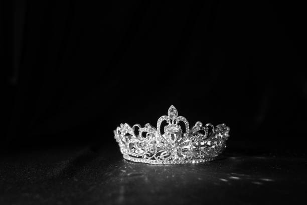 istock Elegance luxury royal crown on satin, silk background. Black and white 1452047465