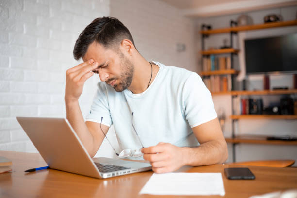 istock Portrait of a successful man at cozy home office 1452050049
