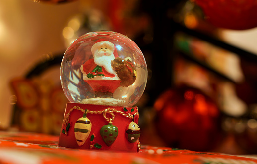 Santa Claus in a snow globe