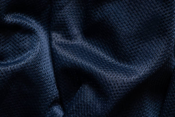 istock dark blue fabric wrinkled as background close up 1452069339