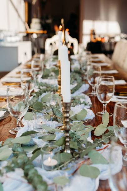 istock Vertical closeup of a decorated wedding table at a restaurant 1452071803