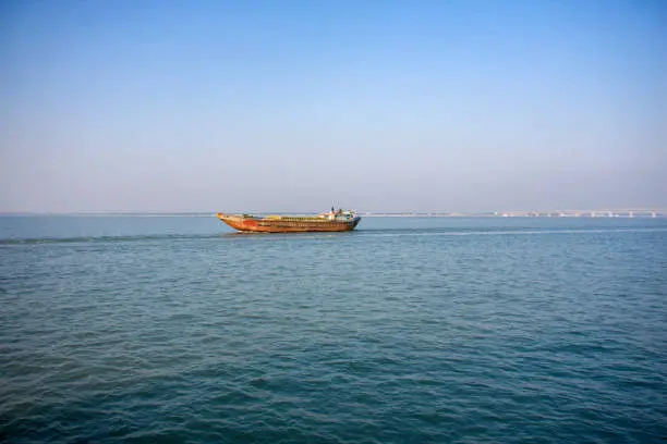 Photo of The Padma Multipurpose Bridge and Cargo ship