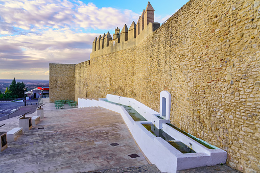 Medieval wall and source of fresh water in the picturesque town of Medina Sidonia, Cadiz