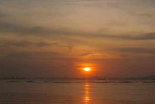 istock Sunset sky at sea with Koh Si Chang island background 1452083625