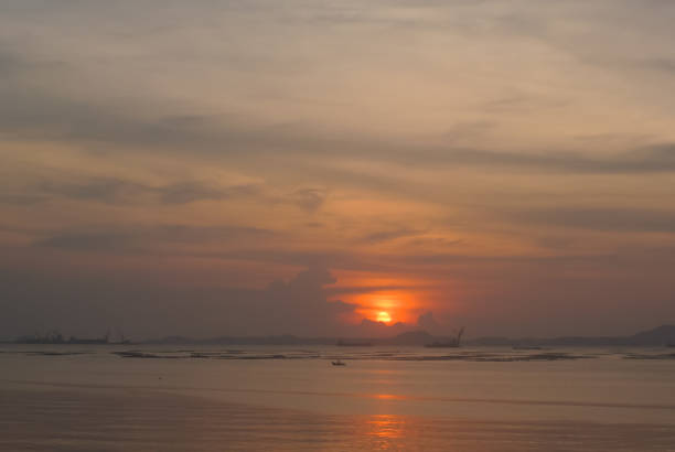 istock Sunset sky at sea with Koh Si Chang island background 1452083664