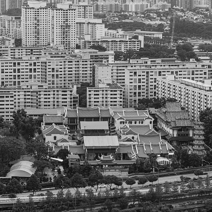 Singapore, Singapore - September 20, 2021: The Interlace, an apartment complex resembling shipping containers stacked on top of each other.