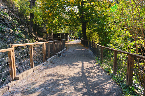 path way alley forward in beautiful autumn Footpath fenced off. High quality photo