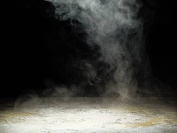 istock White smoke swirl on a black background above the concrete board 1452125170