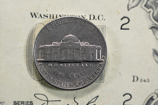 Monticello the primary plantation of Thomas Jefferson the founding father and 3rd president of USA from the reverse side of American money coin of 5 five cents 1964 , old USA vintage retro coin, selective focus