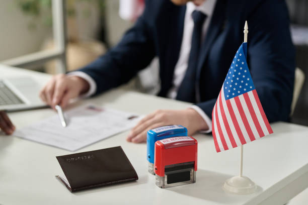 close up of approved and rejected stamps on table - emigration and immigration passport passport stamp usa imagens e fotografias de stock