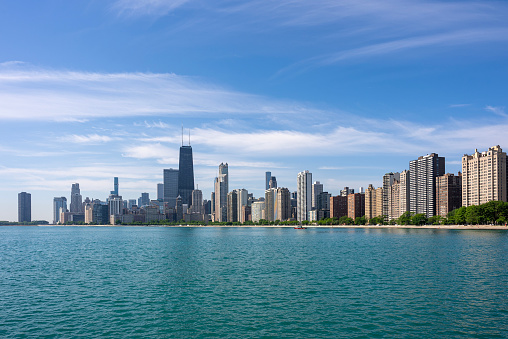 Outdoor panoramics of Chicago with skyscrapers and Michigan lake with sun