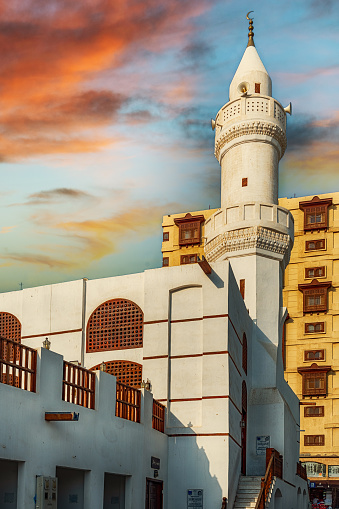 The mosque in the old town of Jeddah in the western province of Saudi Arabia. the photo is taken in aa picturesque sunset setting.