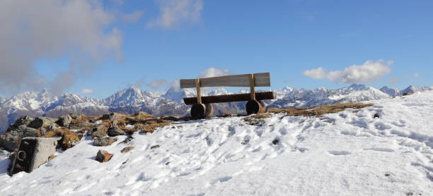 istock an empty bench in the snow on the mountain in tyrol 1452145925