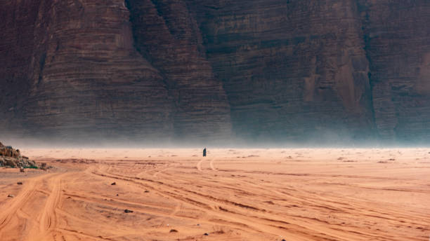 istock A man walking in Wasi Rum desert 1452146066